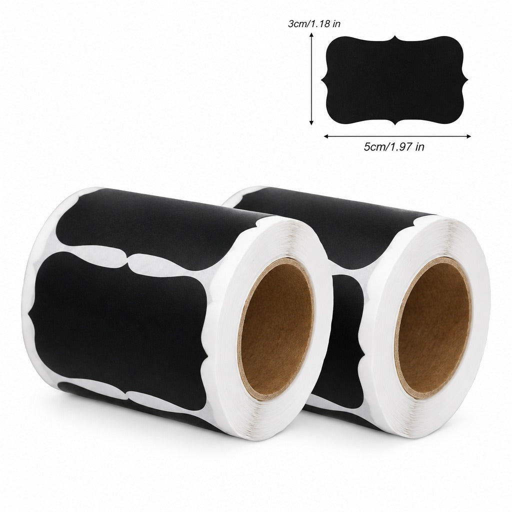 Two rolls of black decorative chalkboard labels with white scalloped edges, shown on a white background with a small size diagram indicating 3cm by 5cm.