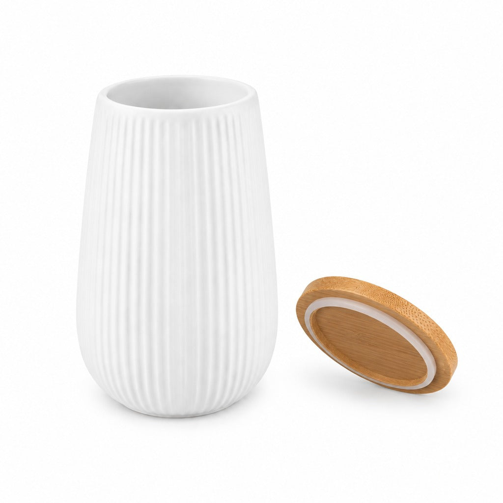 A white ribbed ceramic cup or small vase shown next to its bamboo lid on a clean white background.