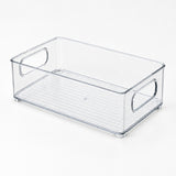 A clear plastic rectangular storage bin with integrated handles on the sides and a ribbed bottom, shown on a clean white background.