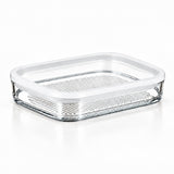 Clear glass food storage container with a matching clear lid and a built-in metal cooling rack, shown on a white background.