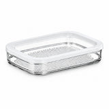 A rectangular clear glass food storage container with a white lid, featuring a ribbed textured bottom, shown on a plain white background.
