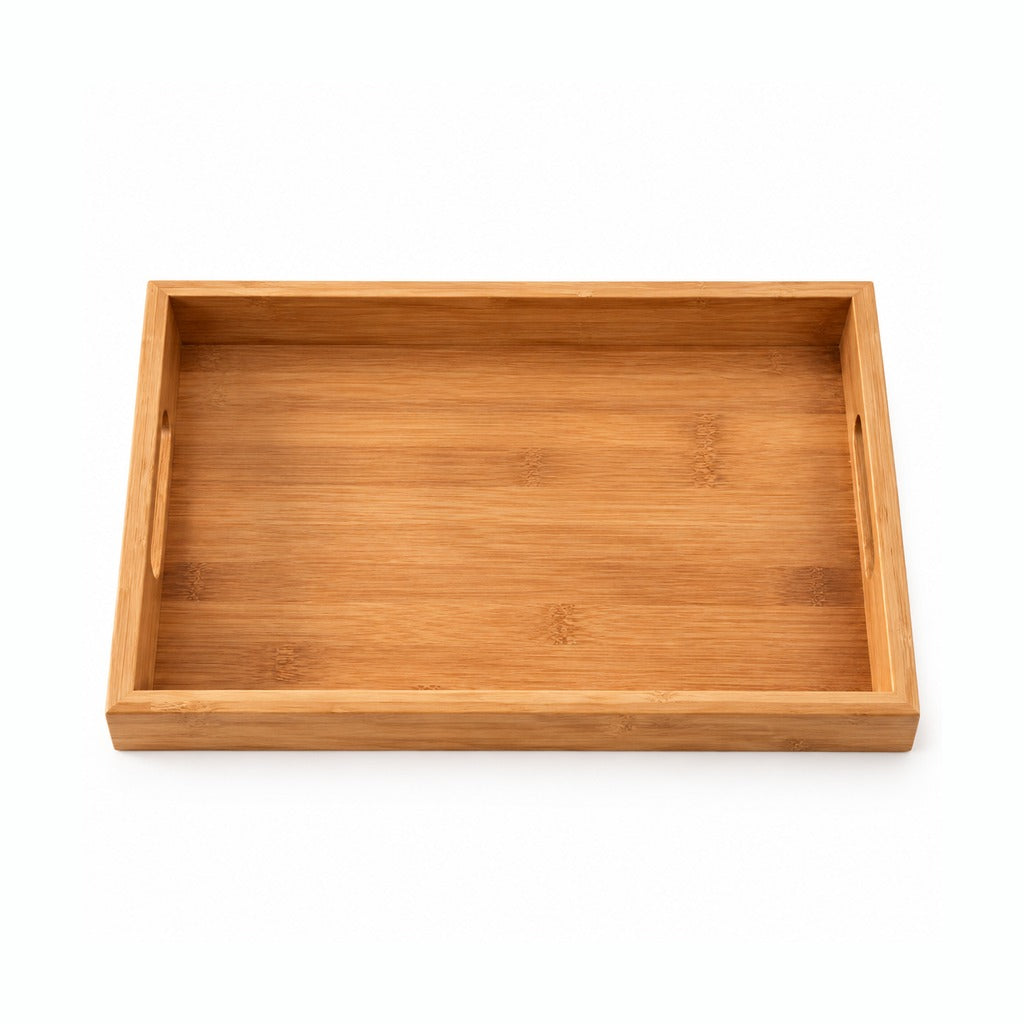 A rectangular bamboo serving tray with a natural warm brown color and visible wood grain texture, shown from a top-down perspective on a white background.