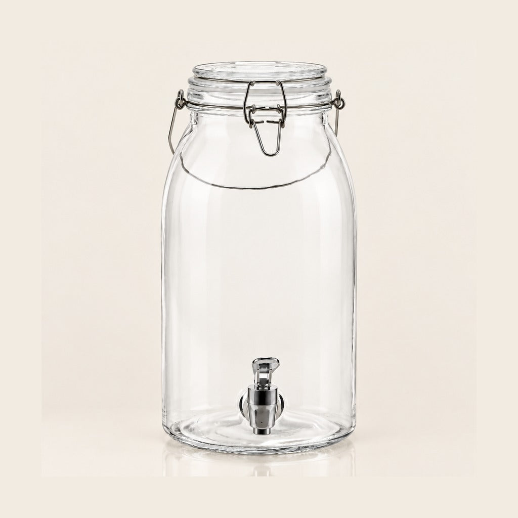 Clear glass beverage canister with a metal wire bail closure and a stainless steel spout, shown on a plain light beige background.