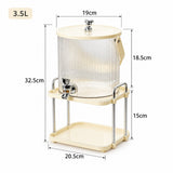 A 3.5L ribbed glass beverage dispenser with a cream-colored plastic base, stand, and lid, shown with dimension lines and labels indicating its height, width, and depth.