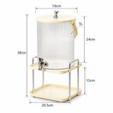 A 5L ribbed clear plastic beverage dispenser with a cream-colored lid, handle, and stand, shown with dimension lines and labels indicating height, width, and depth measurements.