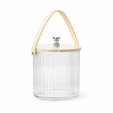 A clear ribbed glass storage bucket with a light natural wood lid, a light wood carrying handle, and a small silver bear figurine on top, shown on a white background.