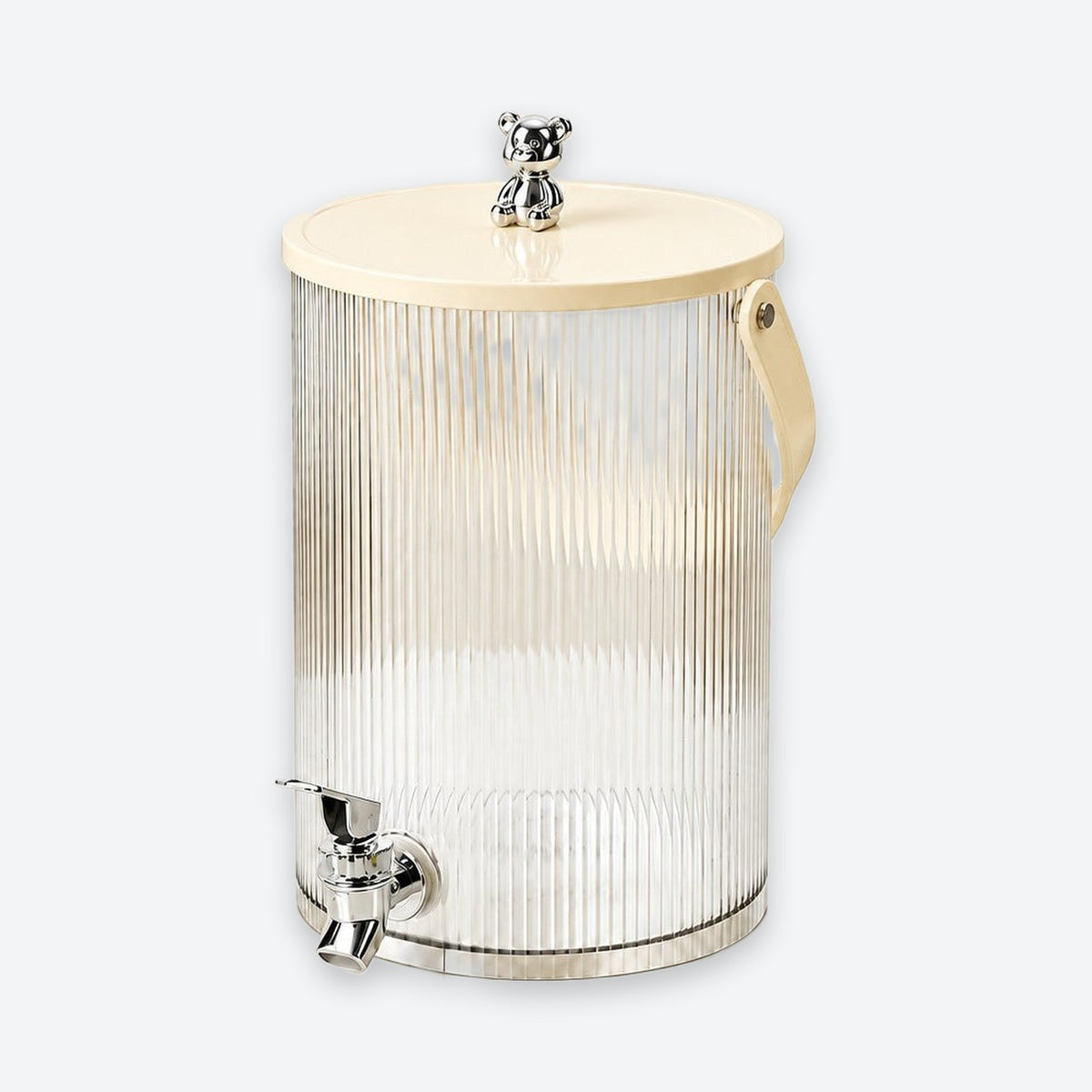 A ribbed clear glass beverage dispenser with a cream-colored wooden lid, a small bear-shaped metal knob, a side handle, and a chrome spigot, shown on a light gray background.