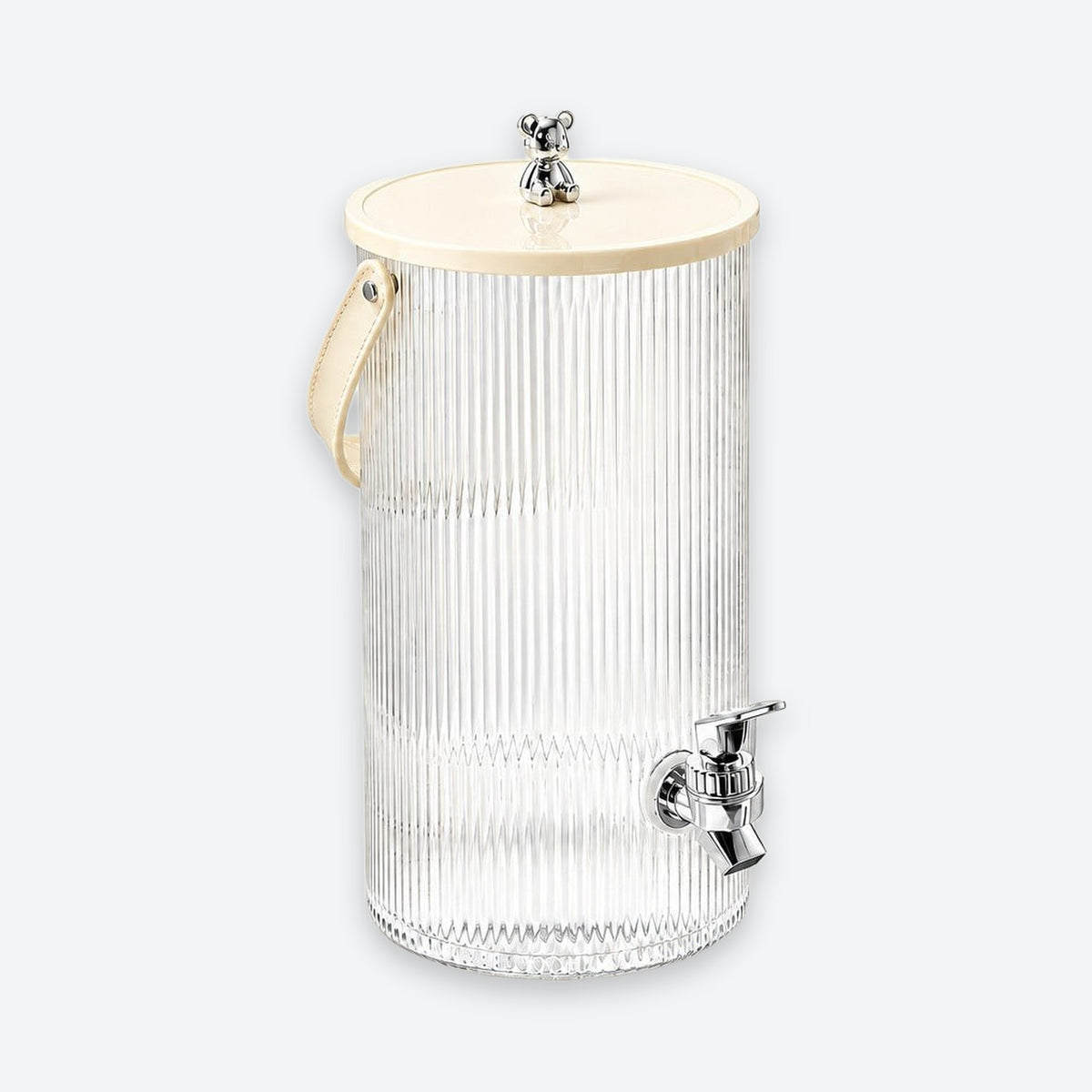 A ribbed clear glass beverage dispenser with a cream-colored lid, a cream handle, and a chrome metal spout, shown on a light gray background.
