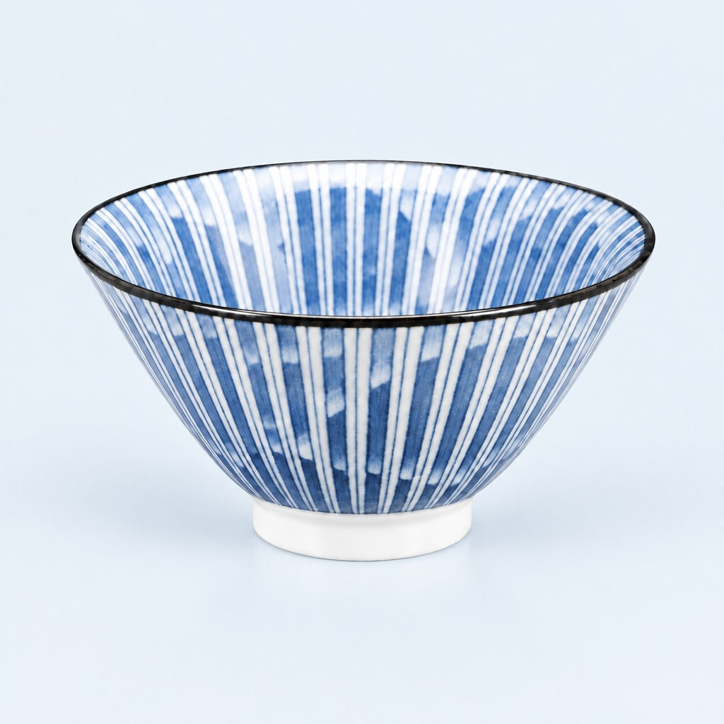 A blue and white striped ceramic bowl with a black rim, shown on a light blue background.