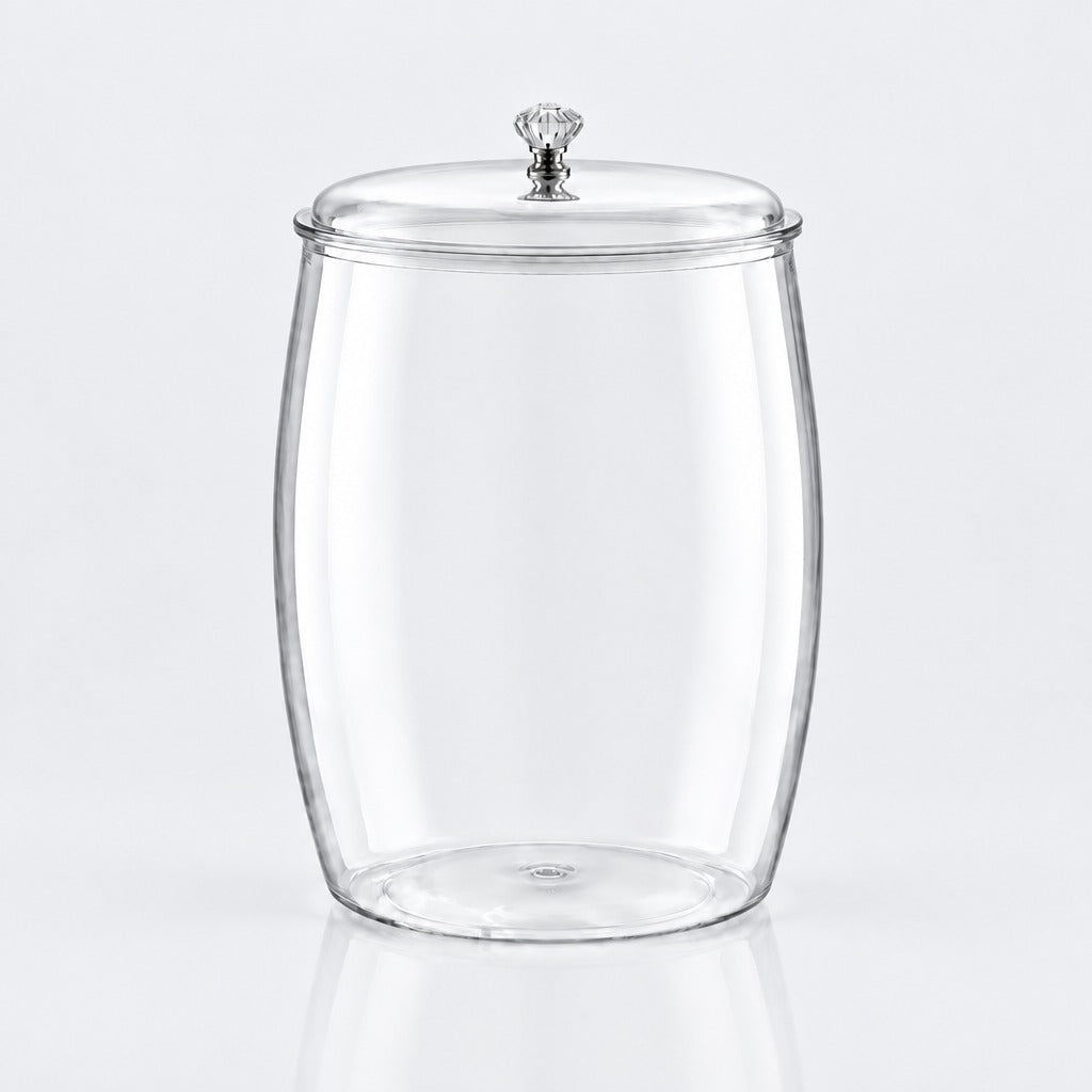 Clear glass canister jar with a matching glass lid and a small silver-toned decorative knob on top, shown on a light gray studio background.