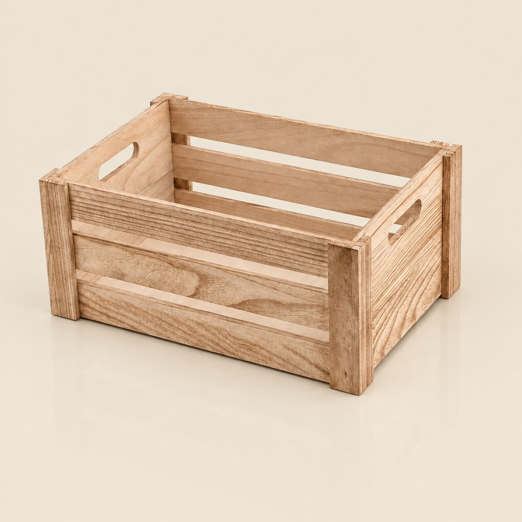 A light natural wood storage crate with handle cutouts on the sides, shown on a clean white background.
