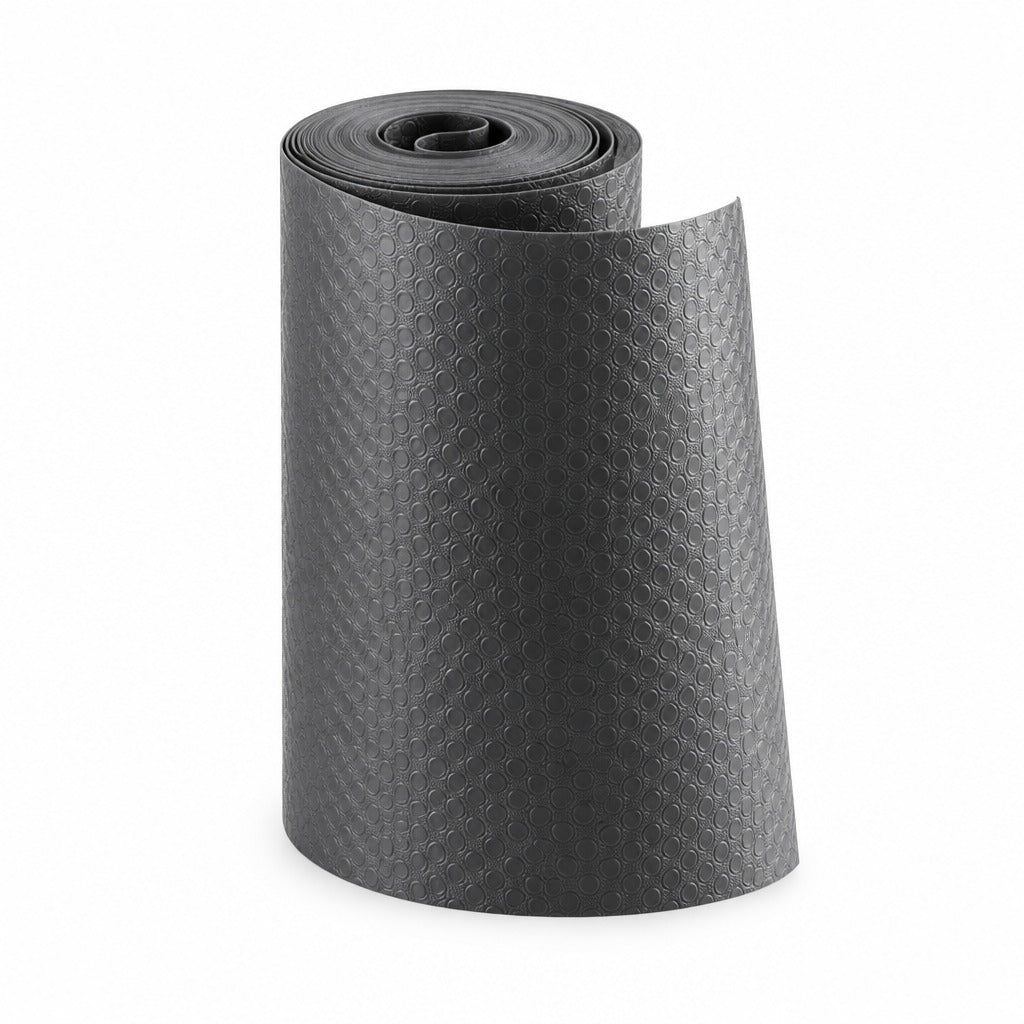 A rolled-up black textured yoga mat with a diamond-patterned surface, shown on a clean white background.