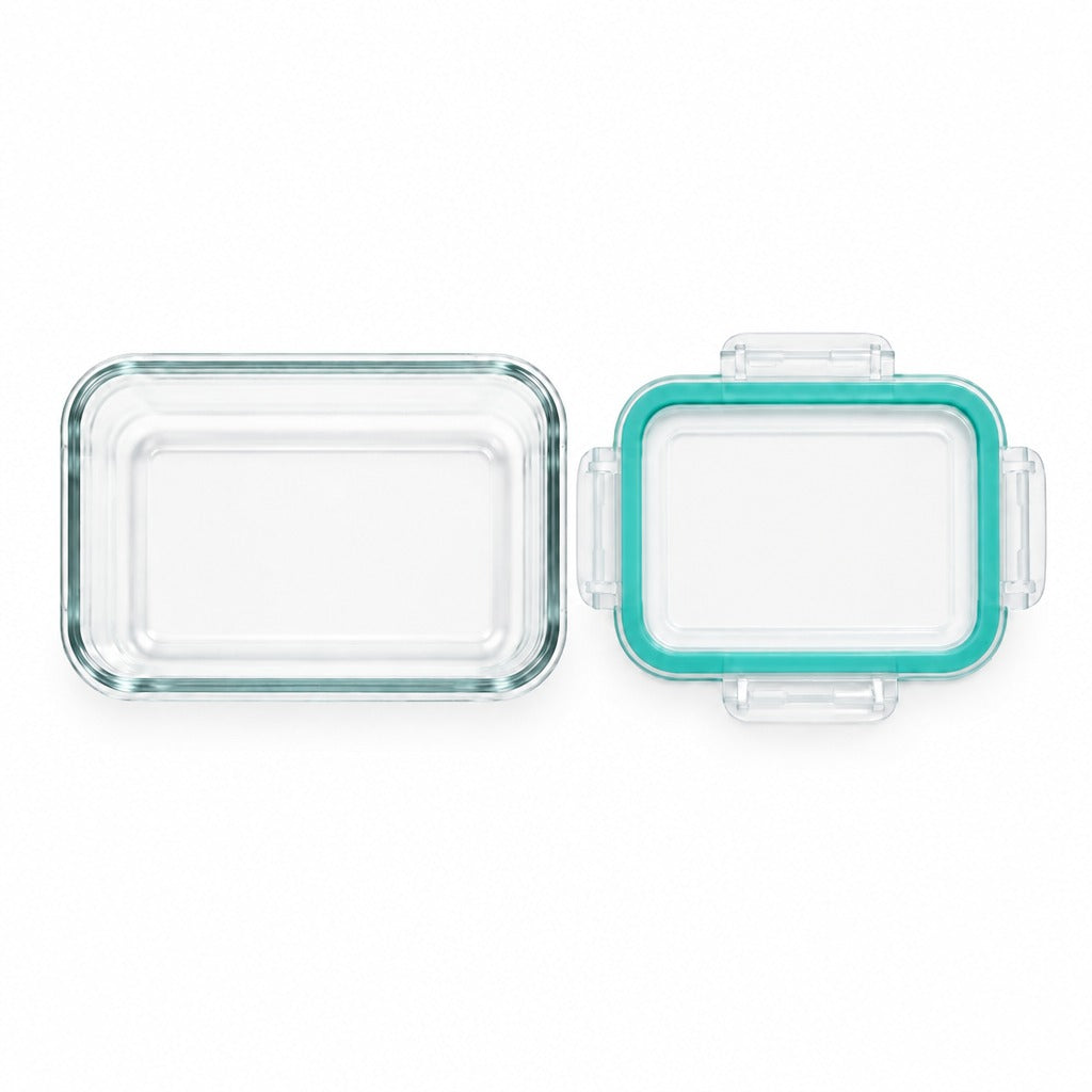 A rectangular clear glass food storage container shown open, with the transparent lid placed beside it. The lid has a bright aqua/turquoise rim and small clear side handles.