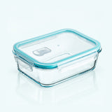 Clear glass food storage container with a light blue silicone seal and matching lid, shown on a clean white background.