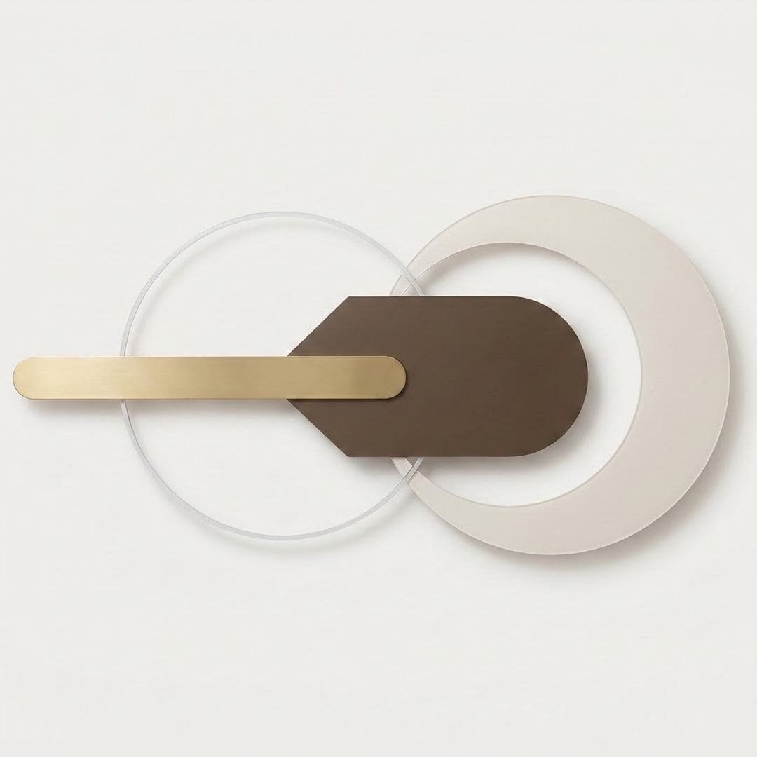 Modern wall-mounted light fixture with a matte brown geometric central plate, a brushed gold horizontal bar, and overlapping translucent and off-white circular rings on a clean white background.