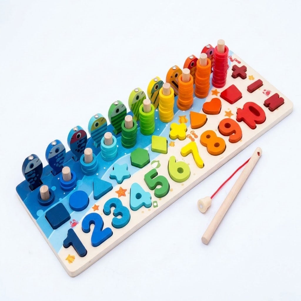 Wooden activity board with rainbow fish, counting rings, shapes, numbers, and a red-cord fishing rod on a white background.