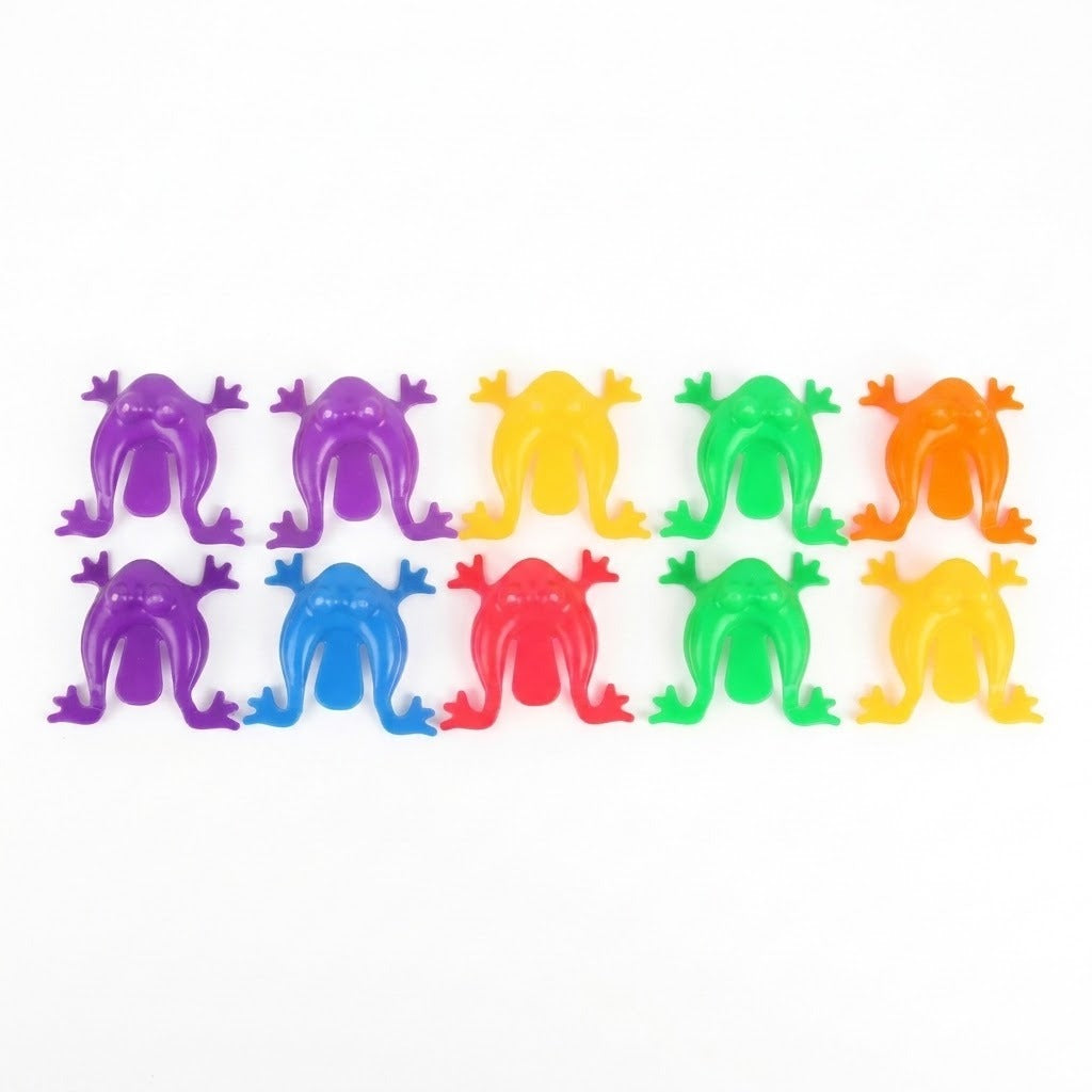 Ten plastic jumping frog toys in purple, yellow, green, orange, blue and red form two rows on a white background.