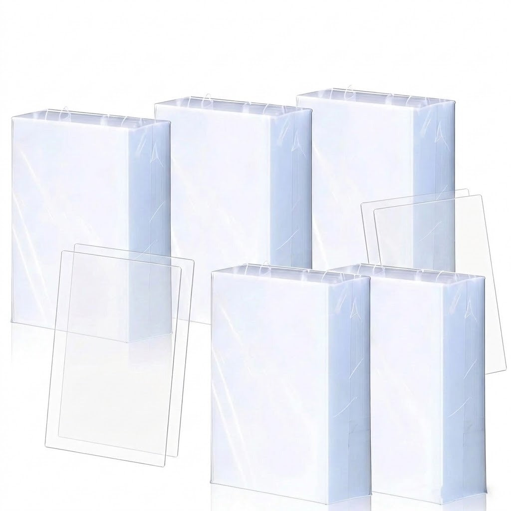 Five upright bundles of clear plastic card sleeves and four loose sleeves are displayed against a white background.
