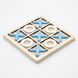 A wooden 3-in-1 tic-tac-toe game board with light blue X's, O's, and a sliding blank piece, set against a clean white background.