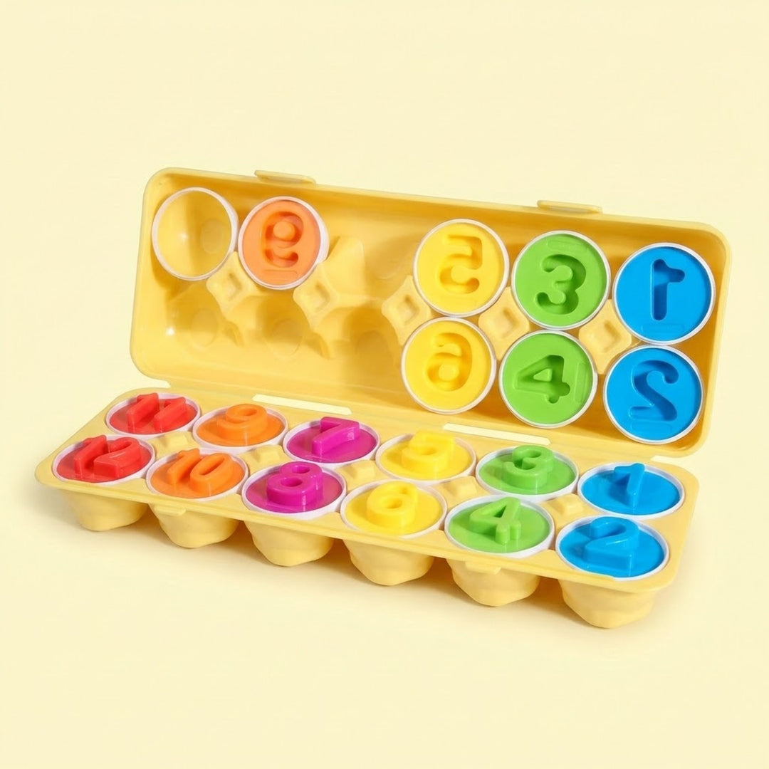 A yellow plastic egg-shaped toy container shown open, filled with colorful numbered letter molds and matching letter pieces in red, orange, pink, yellow, green, blue, and purple, on a pale cream background.