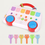 White pop-up toy with red handle, blue paw-shaped pads and colorful flaps, shown with six numbered toy keys on a plain background.