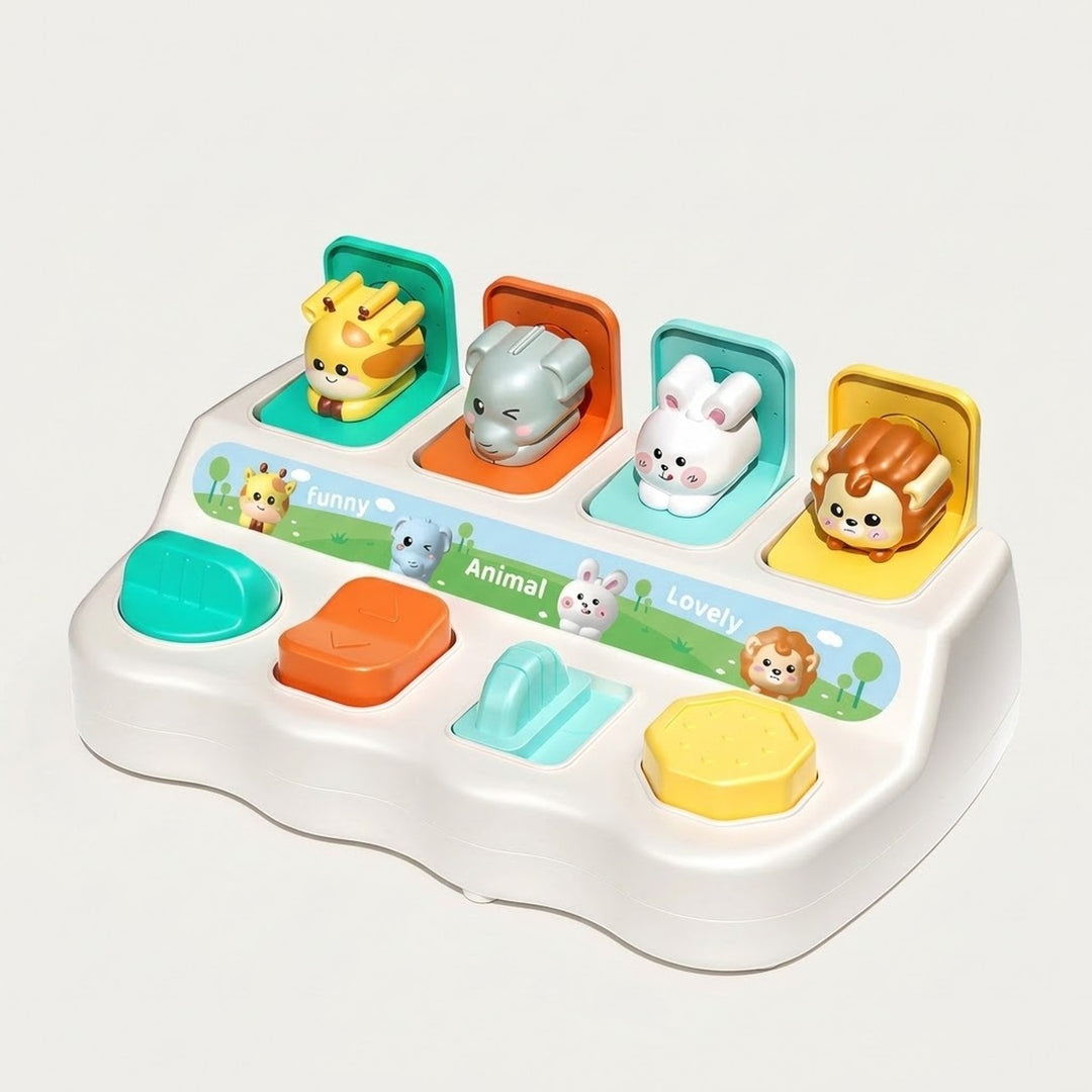A colorful baby toy piano with animal pop-up buttons and touch keys, photographed on a clean light gray background.