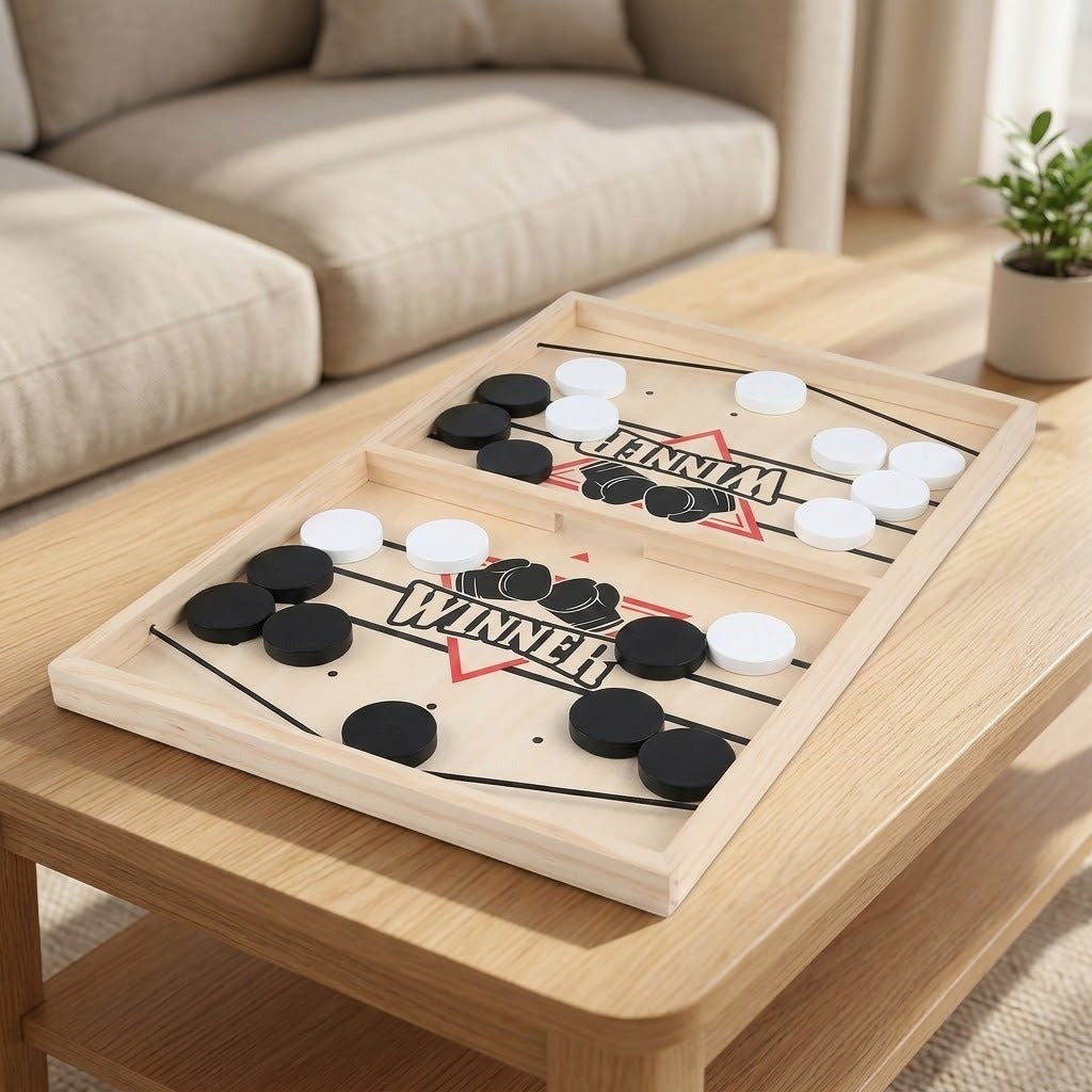 Light wooden sling puck game with black and white pucks on a wooden coffee table beside a beige sofa.