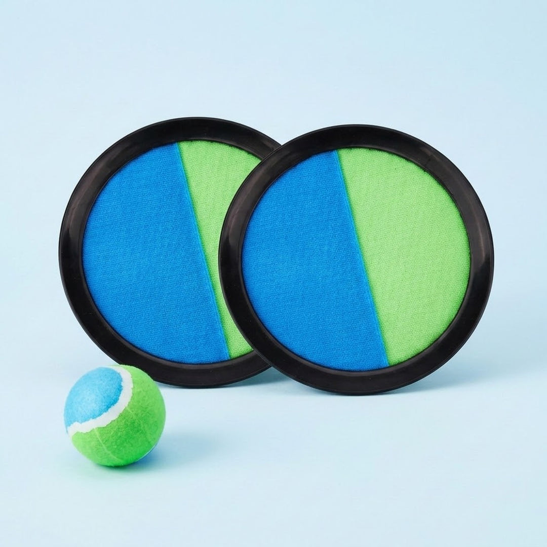 Blue and green catch game set includes two black-rimmed discs and one matching ball against a pale blue background.