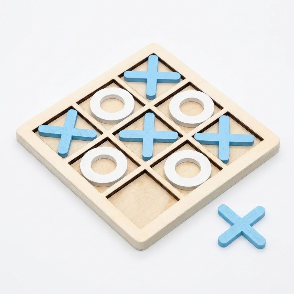 A wooden tic-tac-toe game board with a light natural wood frame, blue X pieces, and white O rings, shown on a clean white background with one loose blue X piece beside the board.