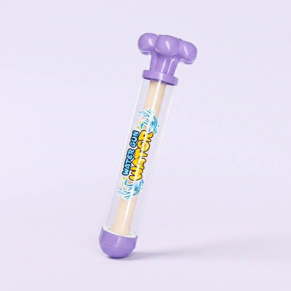 A plastic water gun toy with a clear cylindrical body, purple top and bottom caps, and a beige foam-like inner rod. The body has colorful printed graphics with the text 'water gun'.