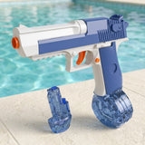 Blue-and-white water gun with a rounded transparent reservoir attached and a smaller detached one on pale paving by a pool.
