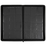 Open black trading-card binder displays empty clear pocket pages against a white background, with the zipper pull at the bottom.