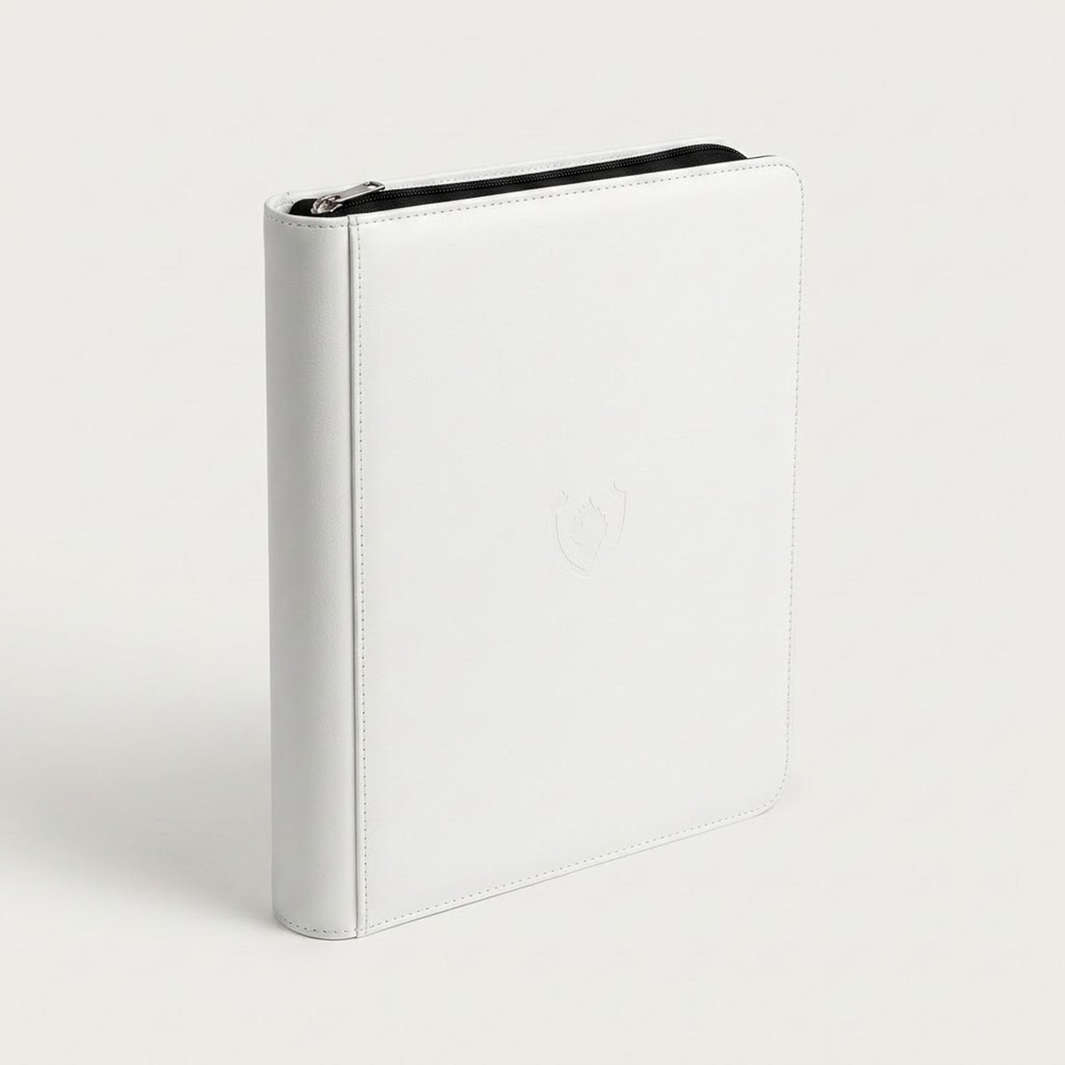 Upright white zippered trading card binder with a smooth cover and black zipper trim on a plain white background.
