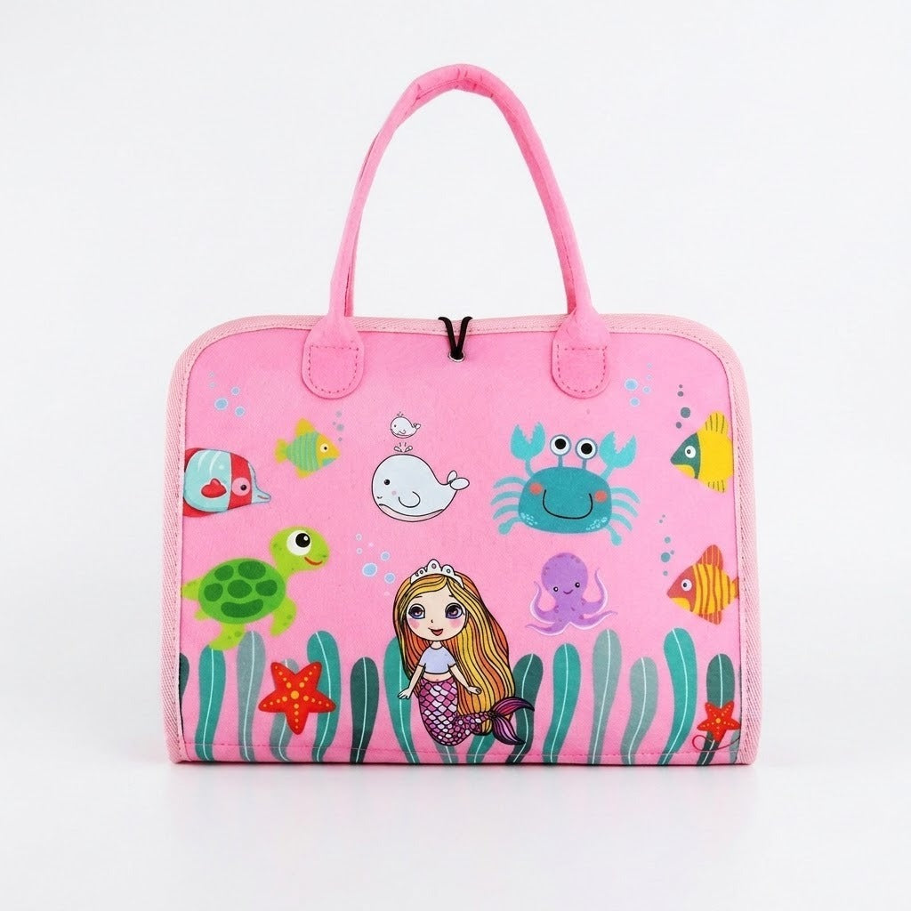 Closed pink busy board with carrying handles and a mermaid and sea creature cover, standing against a white background.
