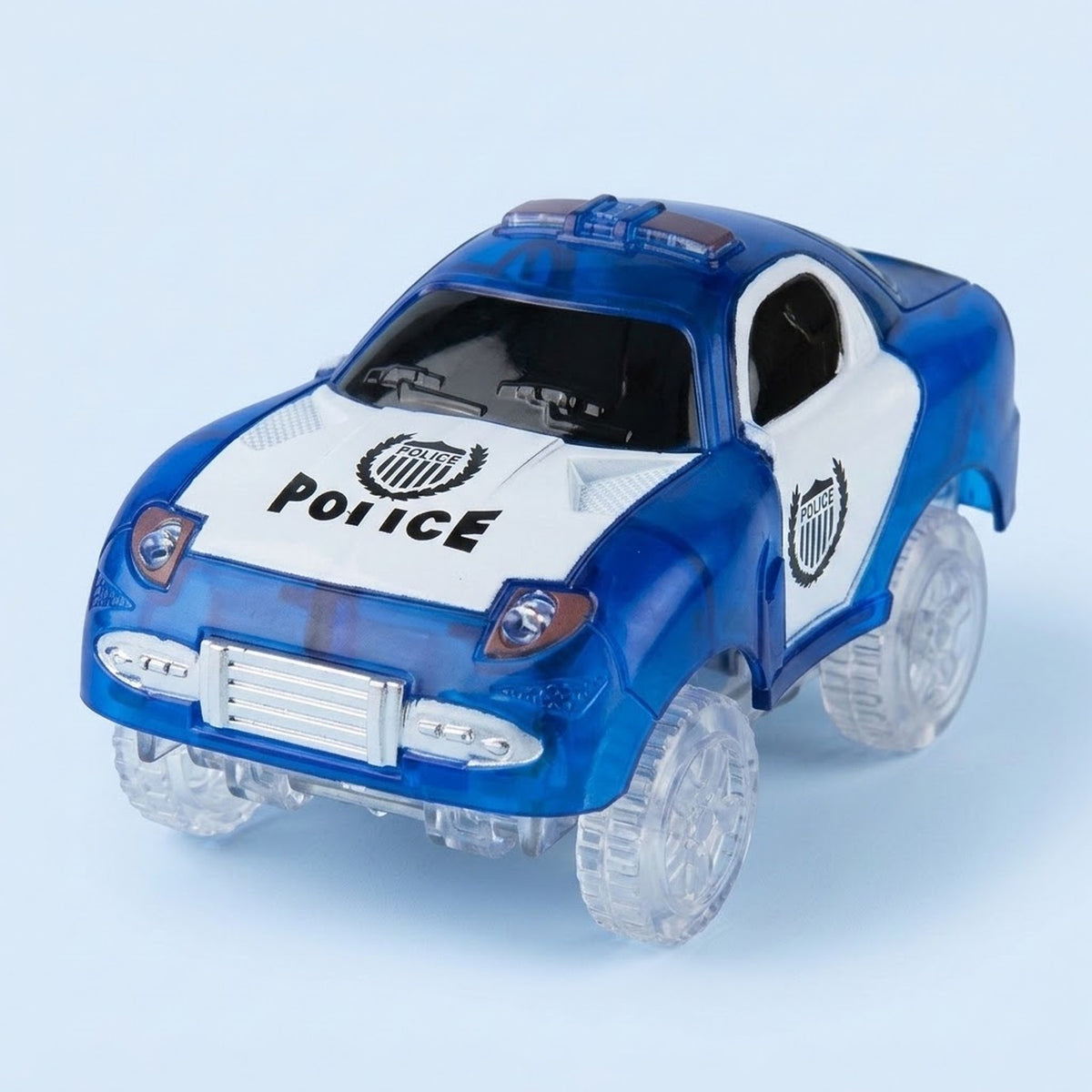 A blue and white toy police car with clear plastic wheels, featuring 'POLICE' text and shield emblems on the hood and side door, set against a light blue background.