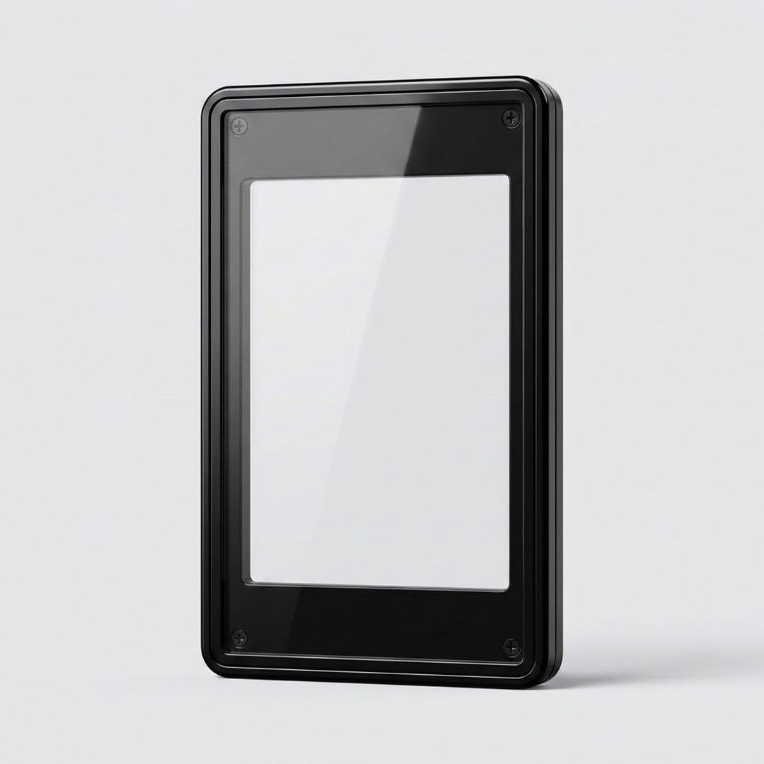 Glossy black aluminum alloy graded card protector stands upright with a clear center and visible corner screws against a light gray background.