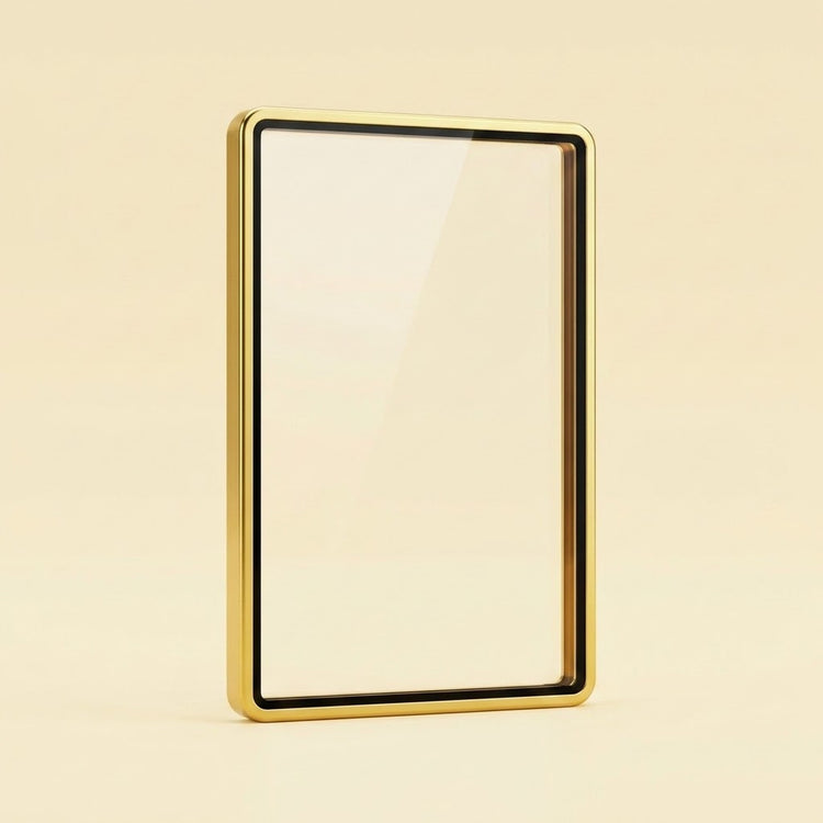 Glossy gold aluminum alloy graded card protector with a clear center and black inner border stands against a pale yellow background.