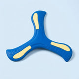 A blue three-blade EVA boomerang with pale yellow accents lies flat on a light blue background.
