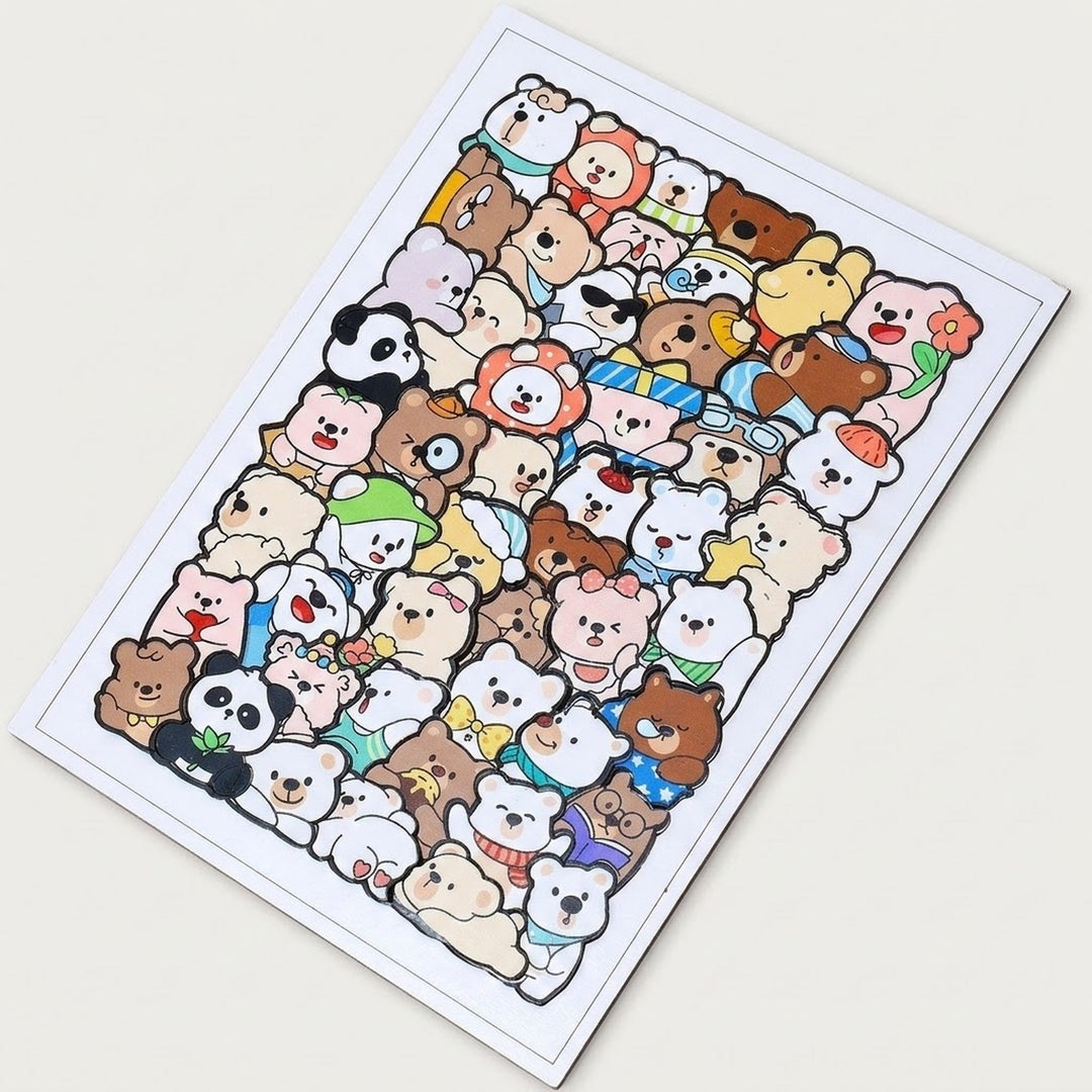 A rectangular bear jigsaw puzzle with colorful cartoon characters and a white border lies diagonally on an off-white background.