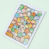 A rectangular dinosaur jigsaw puzzle with pastel cartoon characters and a white border lies diagonally on a pale mint background.