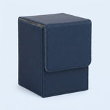 A dark navy blue textured deck box with stitched edges and a closed front flap stands against a pale blue background.