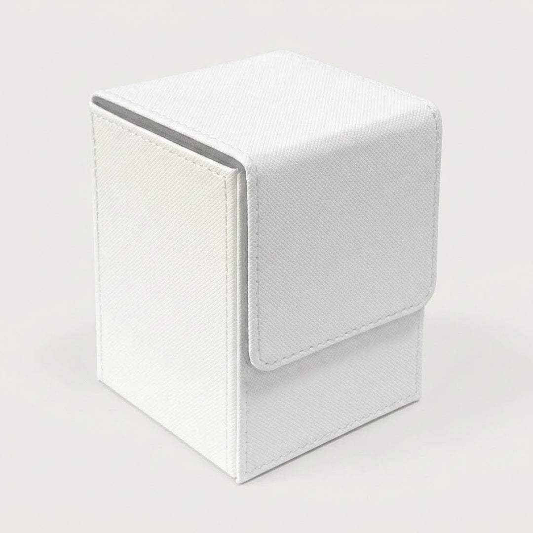 A white textured deck box with visible stitching and a closed fold-over flap stands against a light gray background.