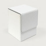 A white textured deck box with visible stitching and a closed fold-over flap stands against a light gray background.
