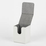 A white deck box sits open on a white background, revealing gray lining and a rounded front cutout.