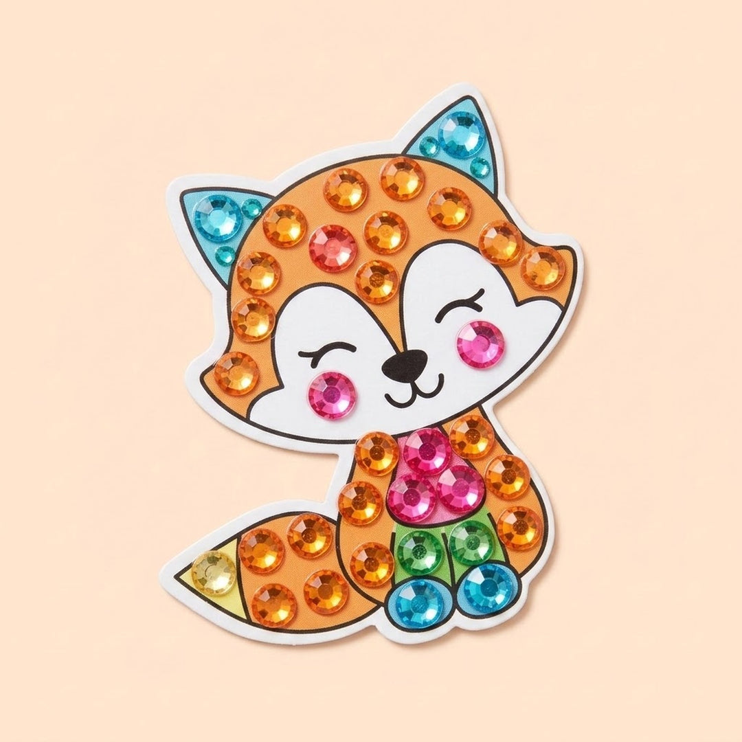 Diamond painting kit fox sticker with orange, pink, blue and green gems shown against a peach background.
