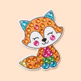 Diamond painting kit fox sticker with orange, pink, blue and green gems shown against a peach background.