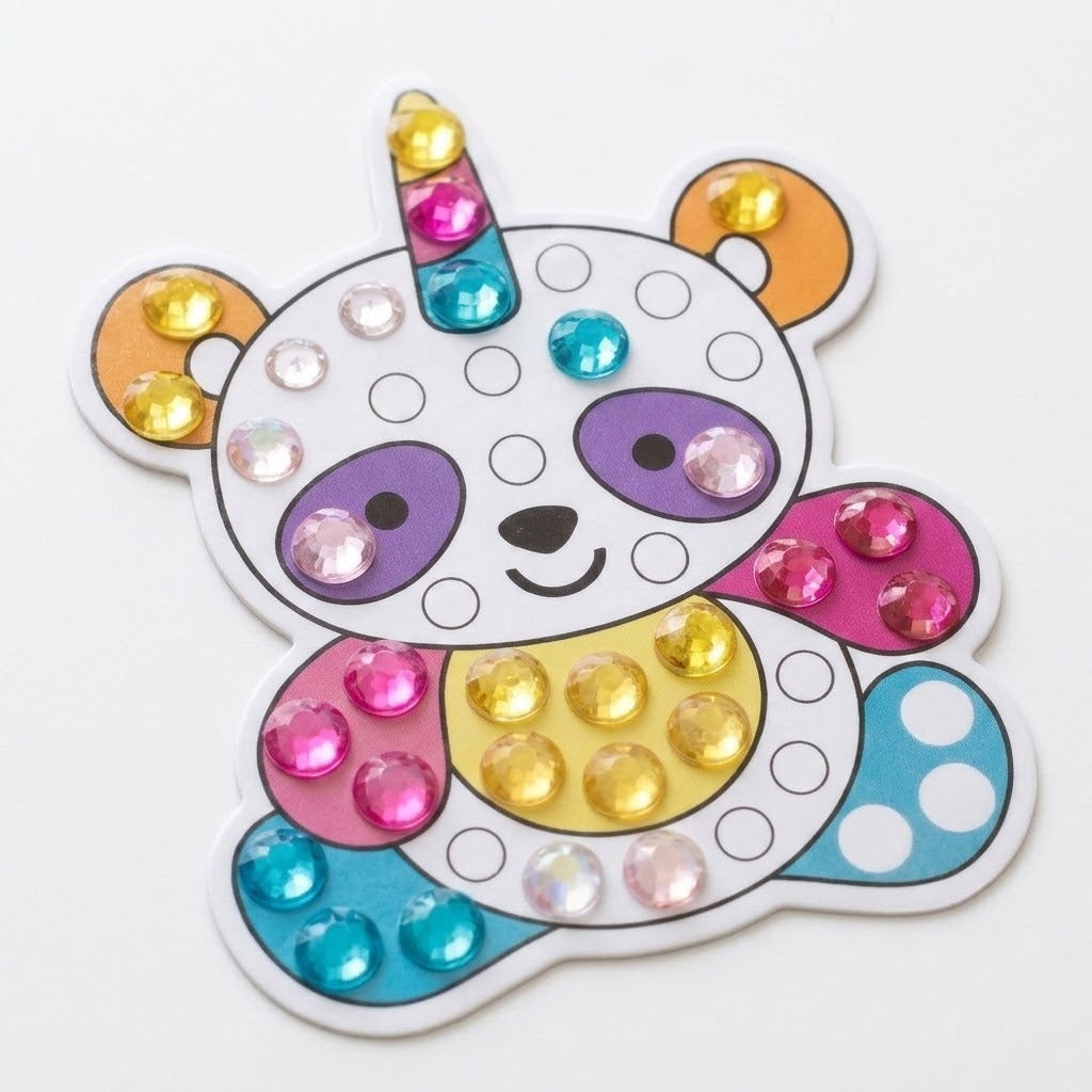 Diamond painting kit with a partially decorated horned panda sticker featuring pink, yellow and blue gems on a white background.