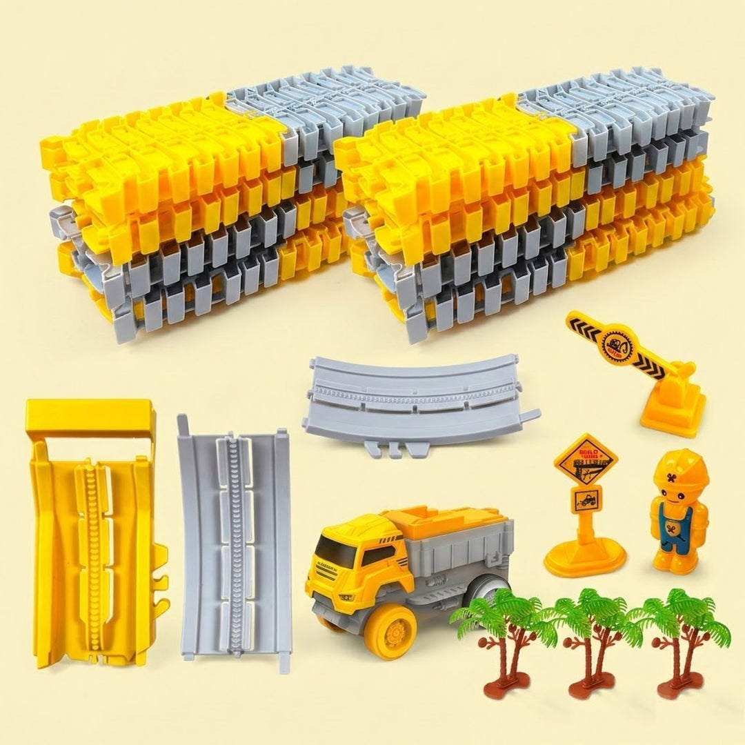 Yellow and gray race track set with stacked plastic sections, a dump truck, worker figure, and palm trees on a pale yellow background.
