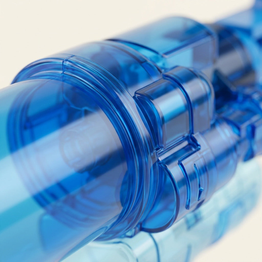 A close-up shows the translucent blue casing and raised circular ridges of an electric water gun against a pale background.