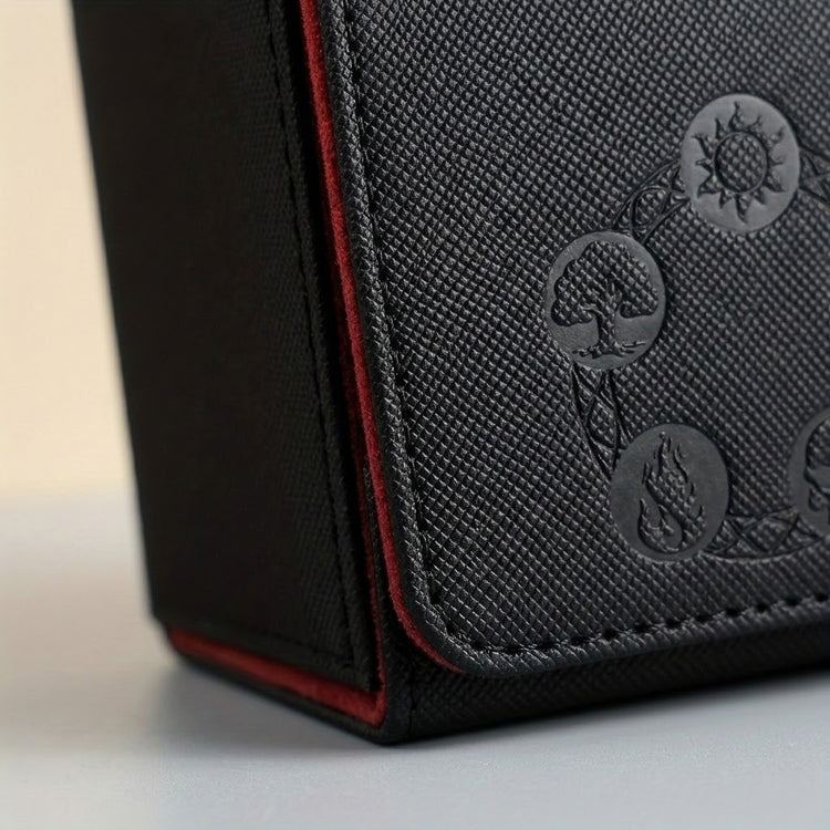Close-up of a black deck box shows textured PU leather, embossed symbols, stitched edges, and red lining along the flap.